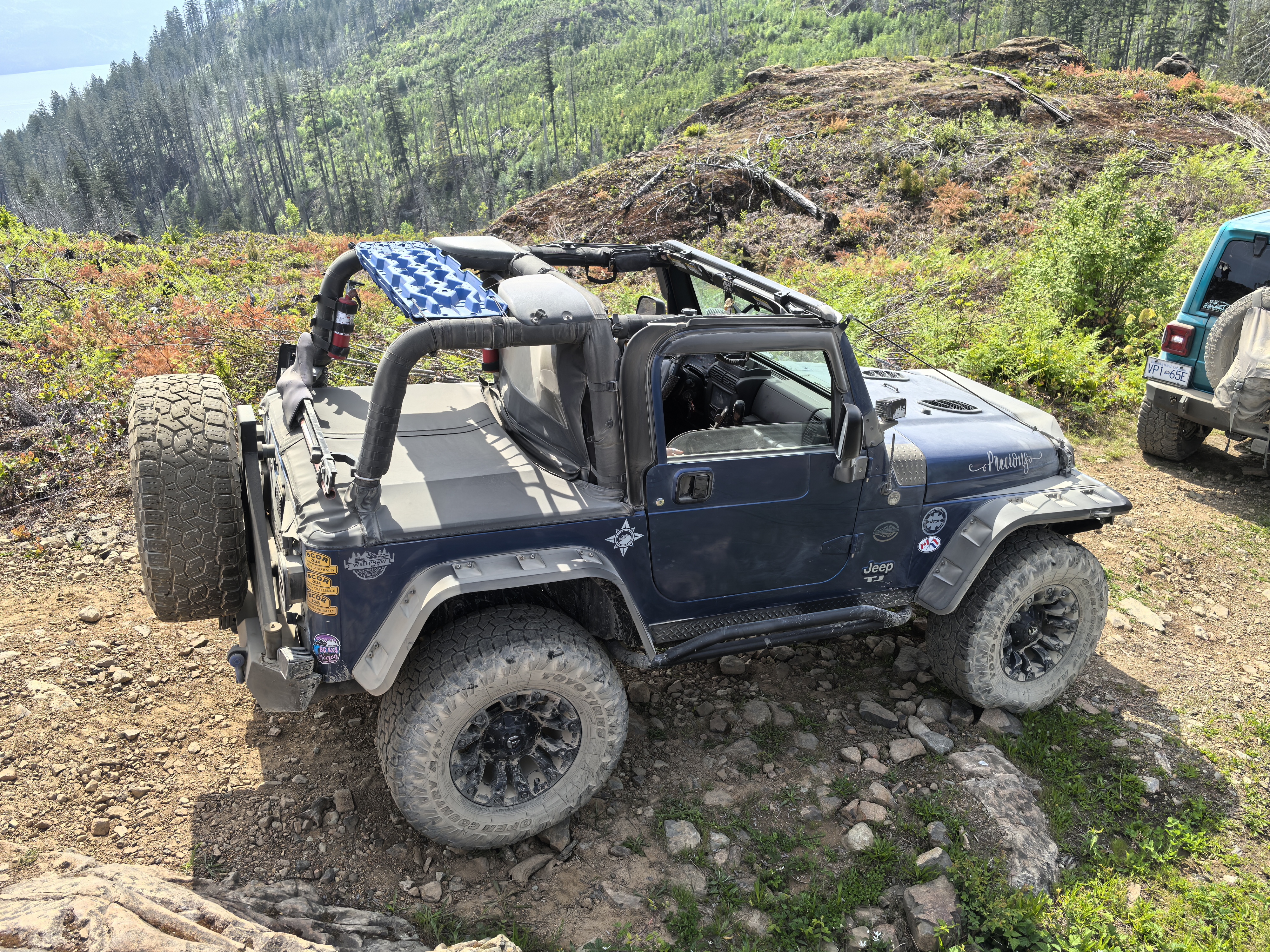 Another angle of the convoy moving through the forest